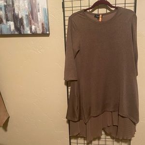 Dress with pleated flair